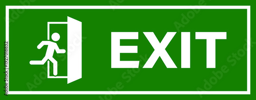A green exit sign featuring a white running man icon and the word EXIT, indicating an emergency escape route