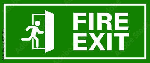 A green and white fire exit sign with a running man icon indicating emergency escape route