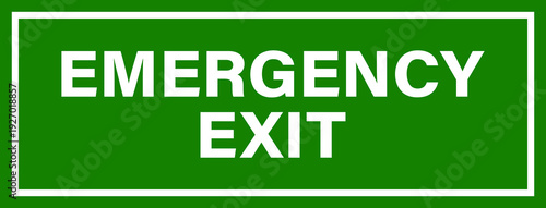 A clear green sign with white text indicating an emergency exit, crucial for safety and evacuation procedures in buildings