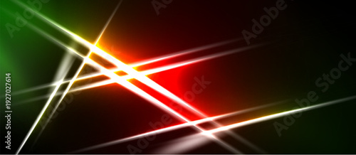 Abstract design features vibrant lines, bright colors. Red, green, yellow intersect creating dynamic visual effect. Dark background enhances luminosity.