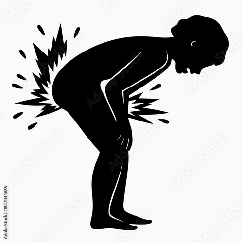 Man experiencing lower back pain while bending over