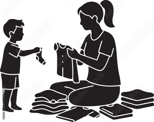 Parent Folding Laundry with Child Handing Sock