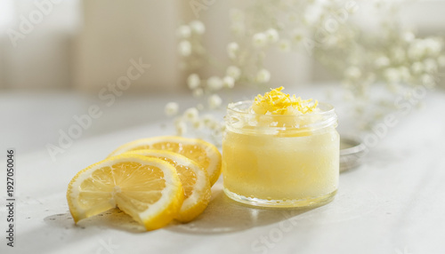 Lemon sugar scrub in a jar with lemon slices