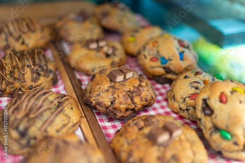Freshly baked chocolate chip cookies with candy toppings