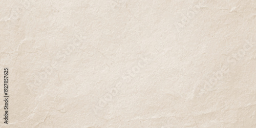 abstract warm cream yellow paper texture background with subtle mottled grain and soft lighting