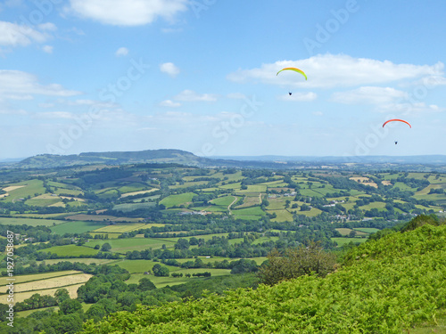 Vászonkép Paragliders in the hills above Pandy in Wales