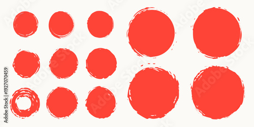 A collection of vibrant red textured circles of varying sizes