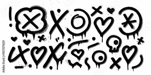 Black graffiti art featuring hearts skulls and various symbols