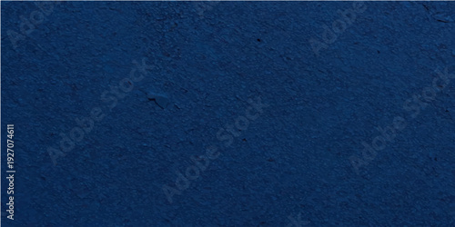 Dark blue denim fabric texture and rough textile material background with a macro weave pattern on a grunge cotton canvas surface