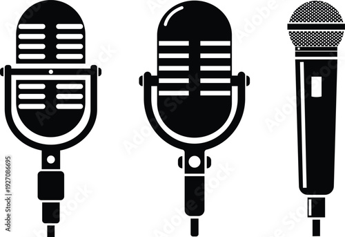 Three classic microphones displayed in a row for audio recording and performance.
