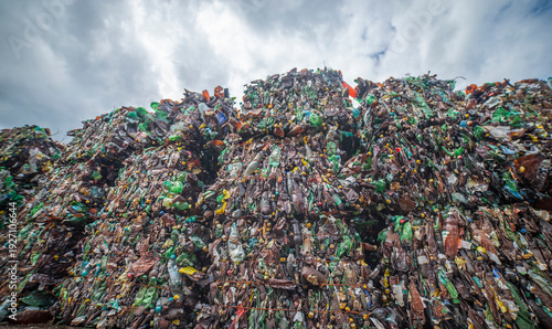 Valokuva Massive Pile of Compressed Plastic Bottles for Recycling with Sky Copy Space