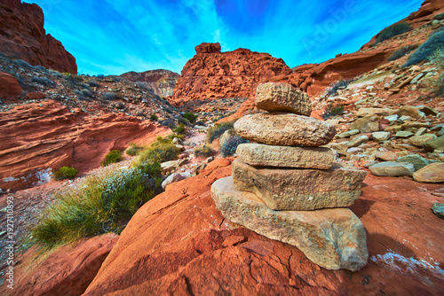 Cairn Rock Stack on Red Sandstone in Vibrant Nevada Desert Landscape