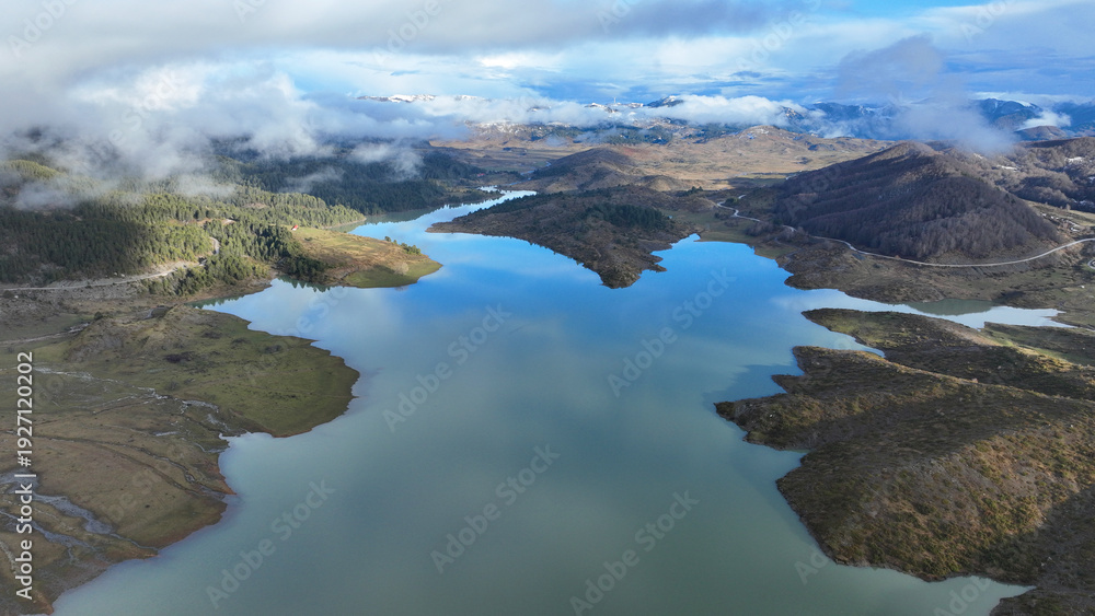 Fototapeta premium Aerial drone photo of beautiful winter colours and amazing cloud reflections in Mediterranean destination artificial lake