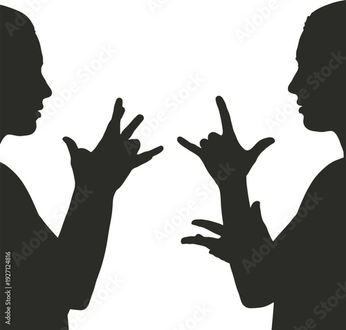 Two people communicating in sign language
