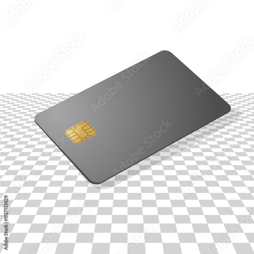 Gray credit card with gold chip on checkered surface