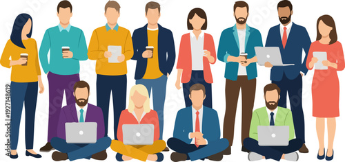 Diverse group of professionals standing and sitting together collaborating while holding various electronic devices like laptops and tablets representing modern teamwork.