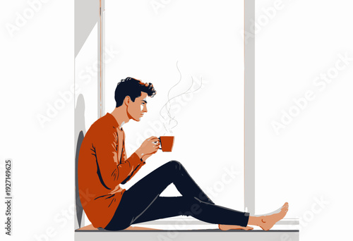Young man sitting by large window sipping steaming coffee, wearing casual orange shirt and blue jeans, contemplating peacefully in morning light