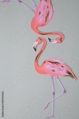 two crafting paper flamingos