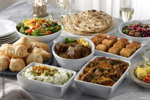 beautifully arranged eid alfitr feast filled with assortment of traditional dishes
