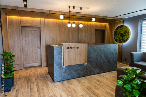 Modern hotel reception desk interior with stylish lobby design and warm lighting