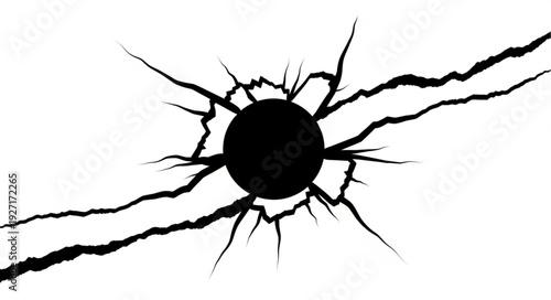 Black hole impact with cracks and fissures spreading outwards on white surface.