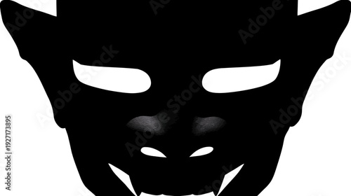 A black, monstrous mask with white eye sockets and a jagged grin against a white background