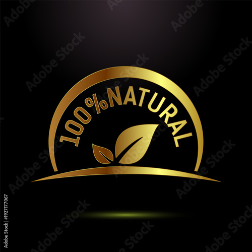 Golden 100% natural stamp with leaves and wavy line on black background