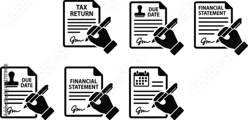 Hand signing tax return document on office desk