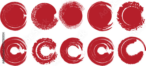A series of red lipstick imprints in the shapes of o and c letters on a white background