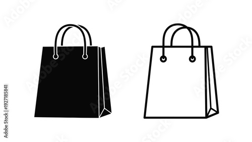 Two shopping bags one dark and one light in silhouette