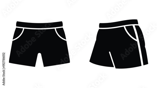 Two pairs of black shorts are displayed as a striking silhouette