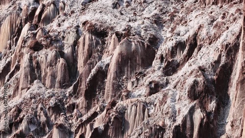 Colorful salt mountains on Hormuz Island in Iran, known as the Rainbow Island, featuring surreal mineral Martian landscape and vivid natural patterns in Persian Gulf. Unique geological formations 