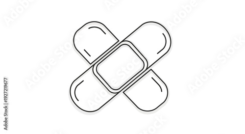 Crossed medical plasters on a white background