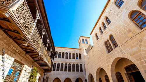 Traditional Syrian Houses Showcasing Intricate Woodwork and Cultural Heritage in Old Damascus or Aleppo
