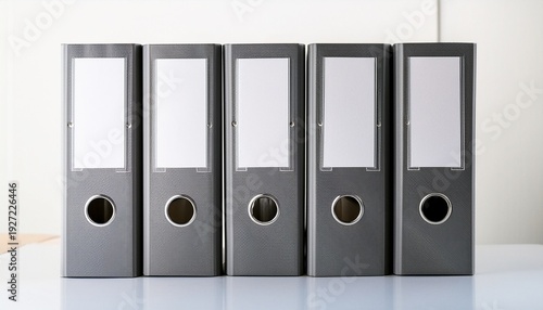Illustration Of Three Gray Ring Binders With White Labels And Ring Holes Lined Up