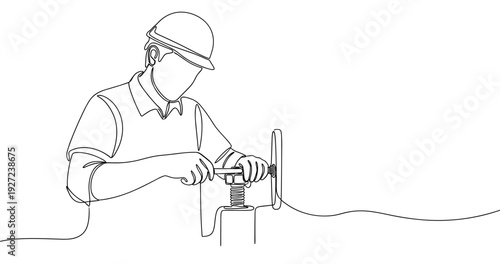 Caucasian male engineer working on equipment line drawing. No editable stroke