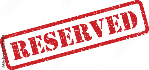 A red distressed rectangular rubber stamp with the word RESERVED printed clearly on a white surface