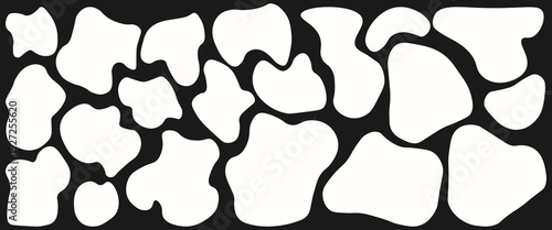Set of abstract blob shapes in white on dark background. Bold organic vector collection for contemporary patterns, posters, packaging, surface design and editorial layouts