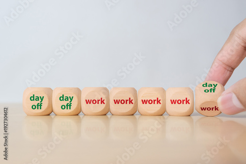 Wooden blocks showing four day work week concept with day off and work schedule. Modern workplace policy, reduced working hours and productivity balance strategy.