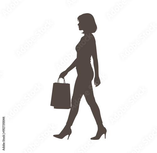 silhouette of a woman walking with shopping bags in her hand