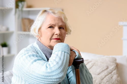 Thoughtful senior woman wit...
