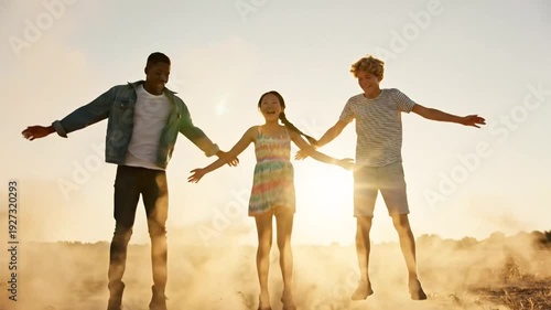 Wallpaper Mural Joyful young friends leaping together in unison against a radiant sunset glow, a dynamic and cinematic capture of freedom, camaraderie, and youthful energy Torontodigital.ca
