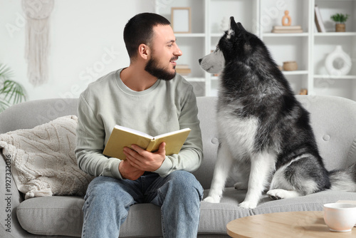 Handsome young man sitting ...