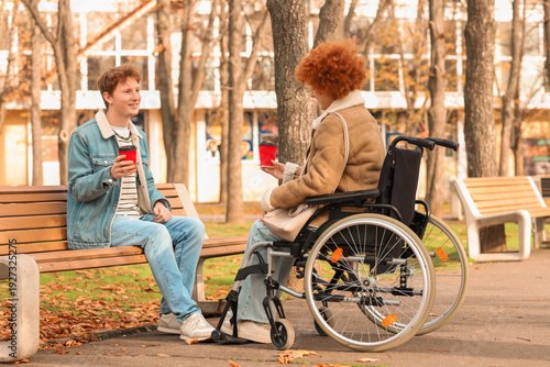 Young woman in wheelchair a...