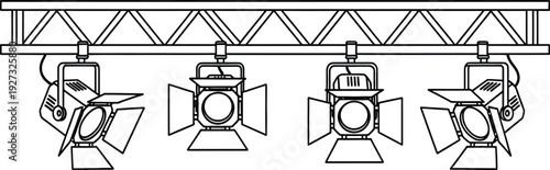 Four stage lights mounted on a metal truss