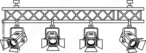 Four stage lights mounted on a horizontal metal truss