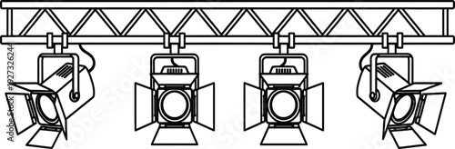 Four stage lights mounted on a metal truss system for theatrical or concert lighting design