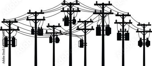 Black silhouette of multiple power lines and utility poles against a