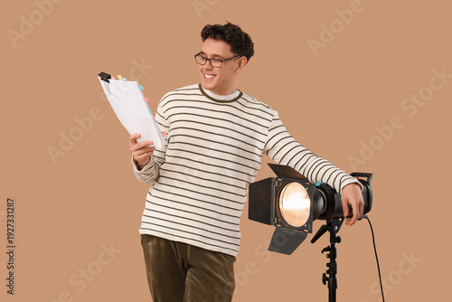 Male screenwriter with scen...