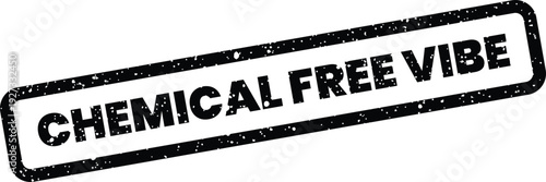 A grunge texture rubber stamp with CHEMICAL FREE VIBE text within a rectangular box, placed at a slight angle